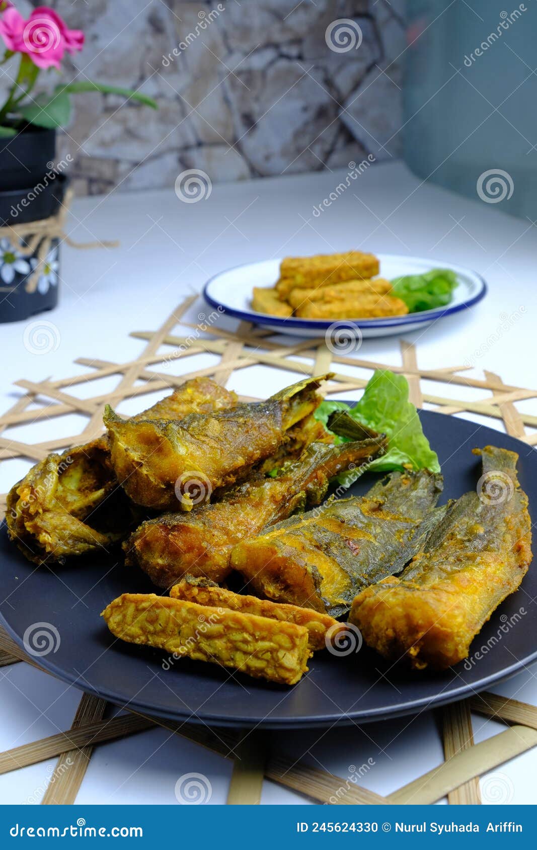 Ikan Keli or Fried Catfish on Black Plate Stock Photo - Image of breakfast,  lunch: 245624330