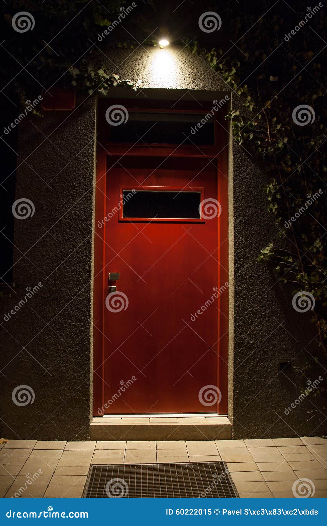 Illuminated door at night stock image. Image of closed 60222015