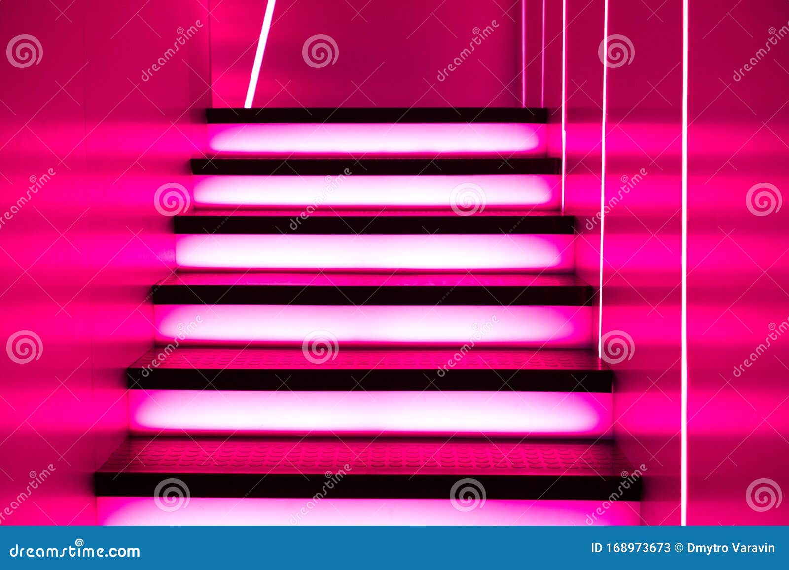 illuminated futuristic staircase in pink neon lights