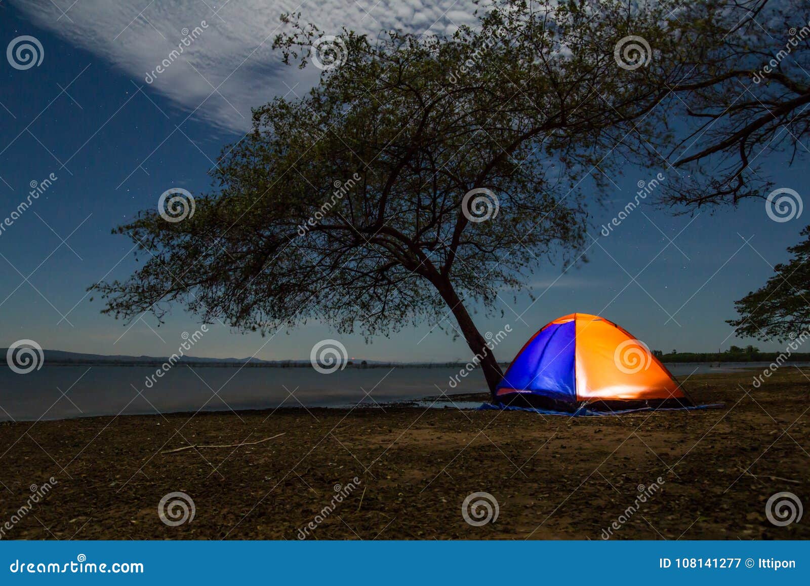 Illuminated Orange Camping Tent Under the Tree Stock Image Image of