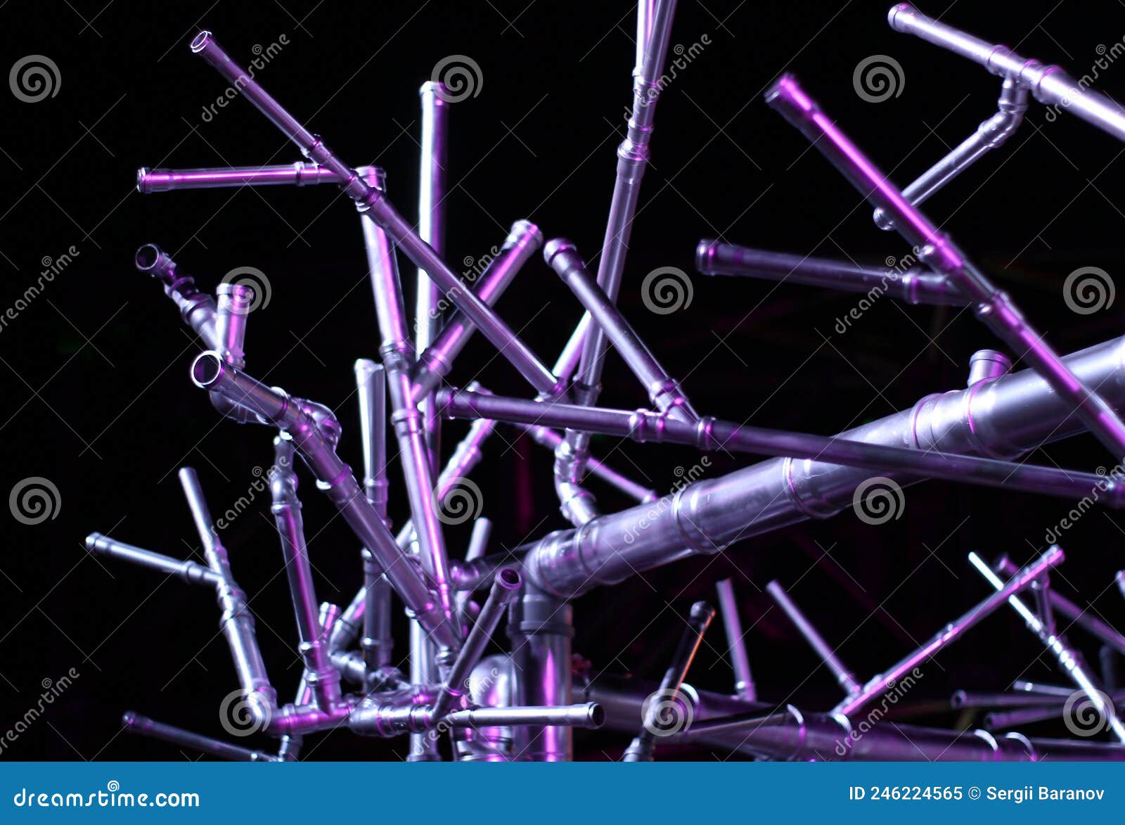 illuminated steel tubes structure in darkness pattern background