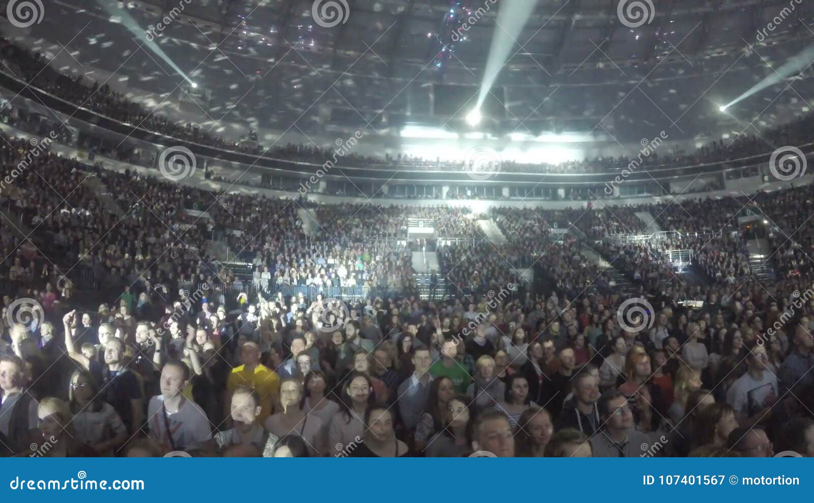Illumination Spots Moving On Ceiling Light Flashing Crowd Enjoying Concert