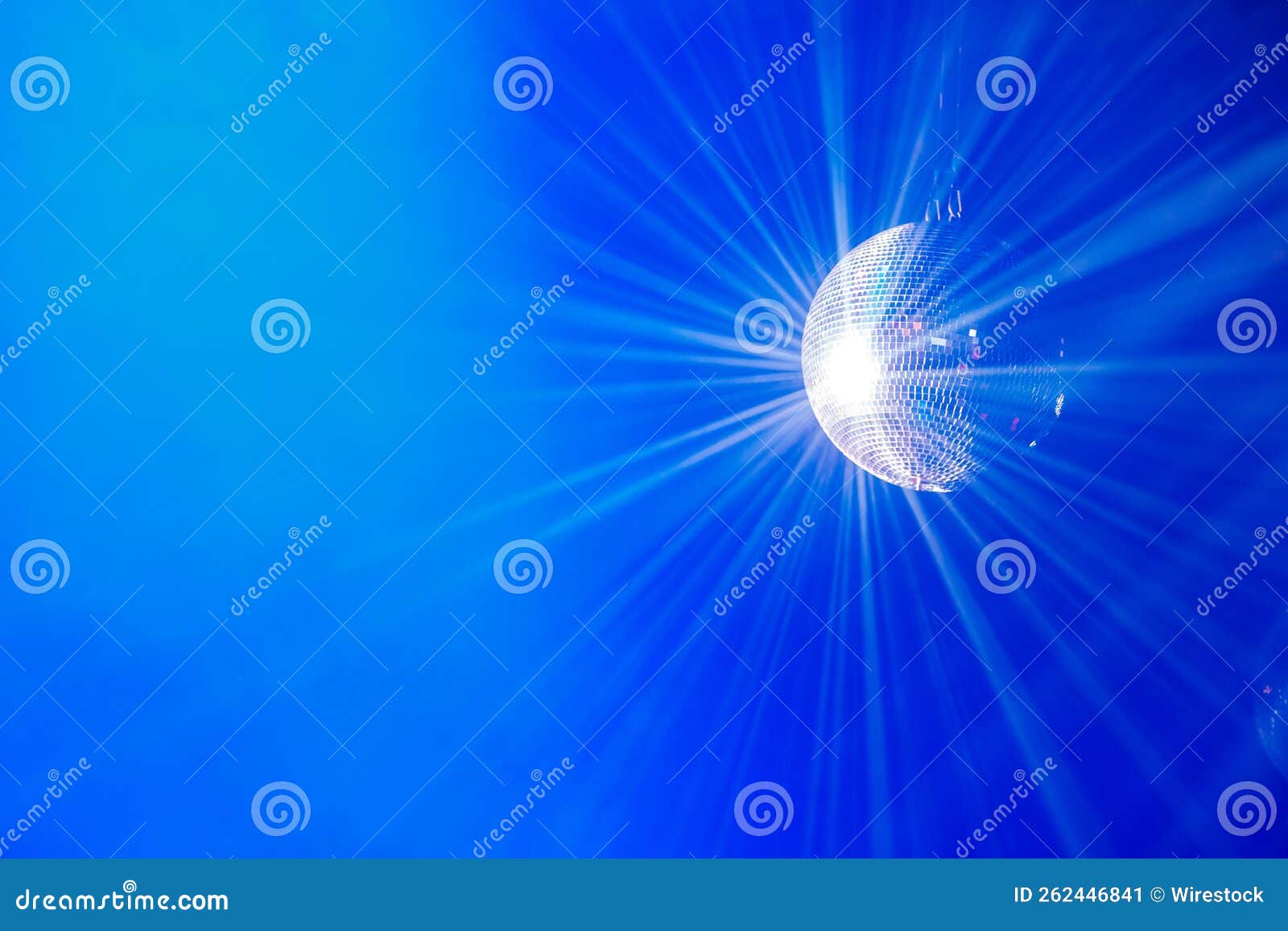 Illustration Design of the Rays of a Mirror Disco Ball on a Blue