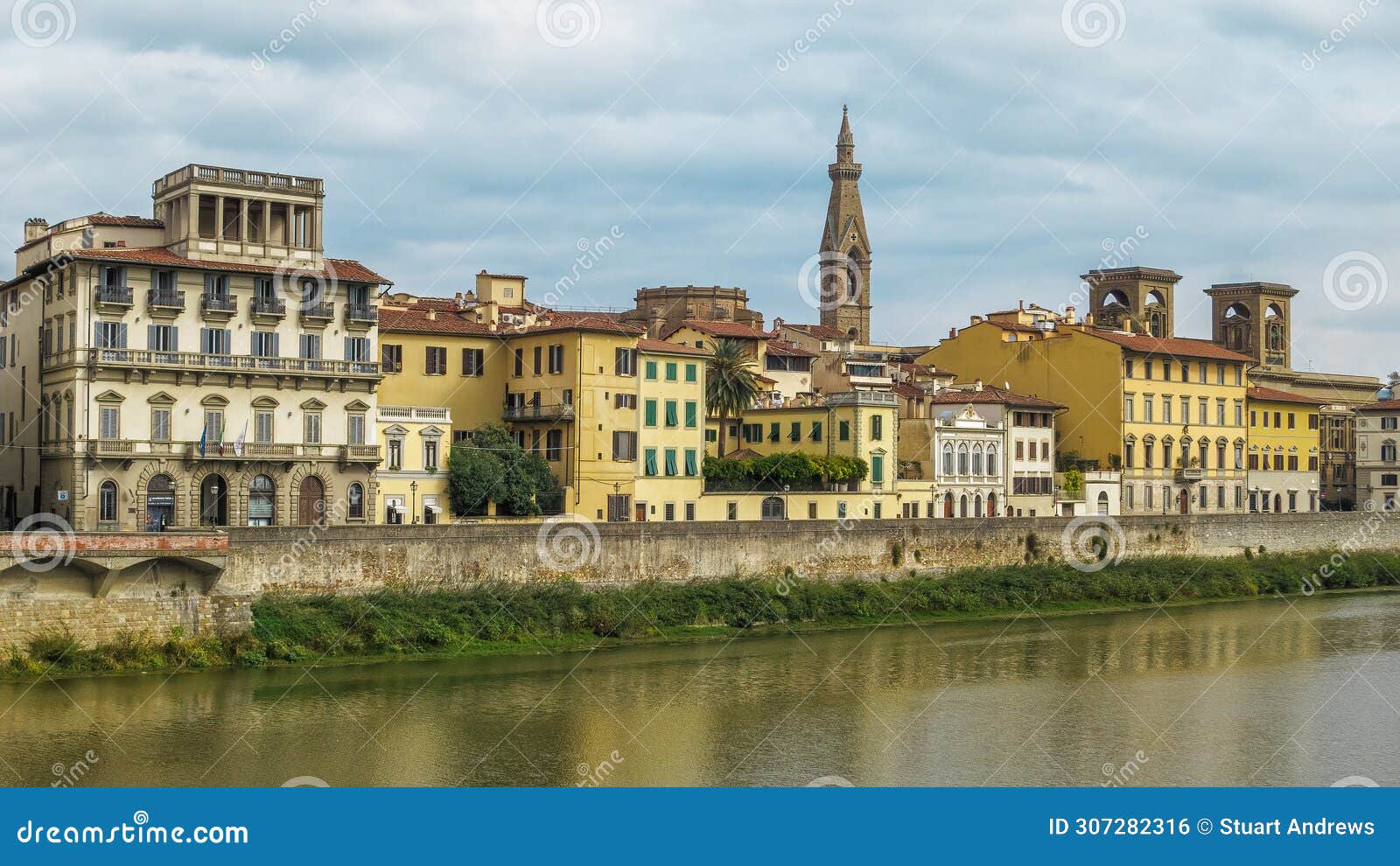 traditional buildings along the arno river, florence italy.