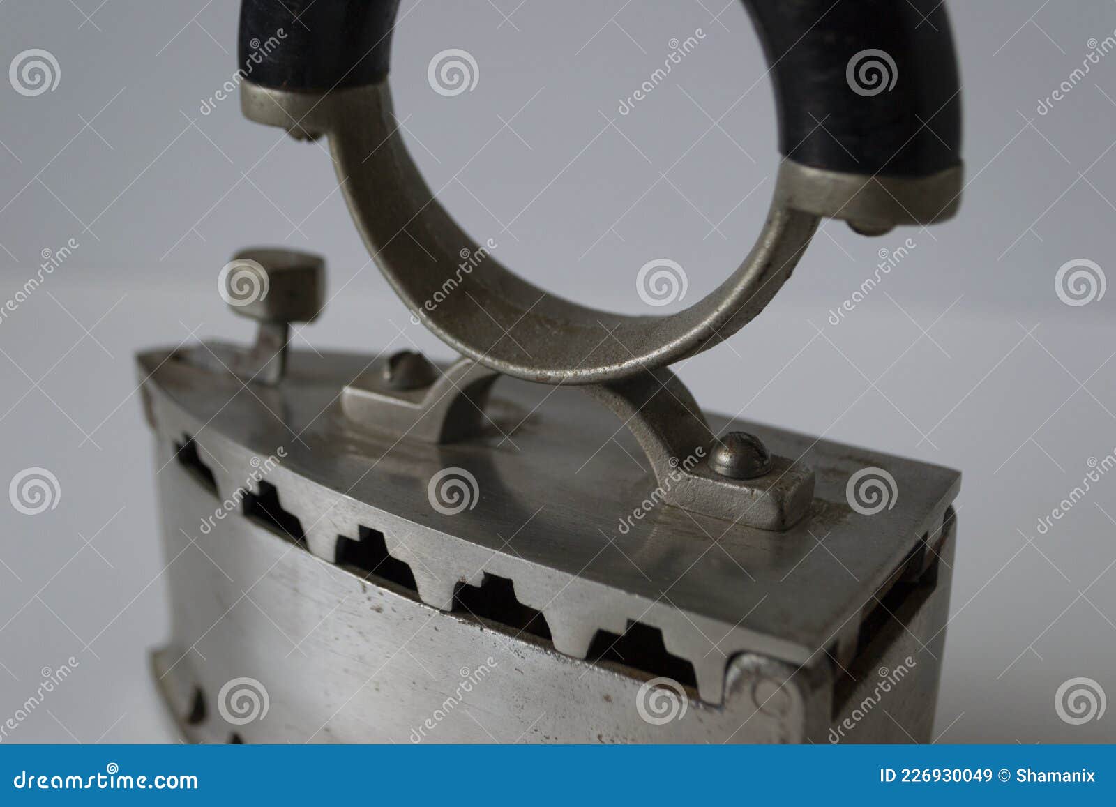vintage smoothing-iron with glowing surface