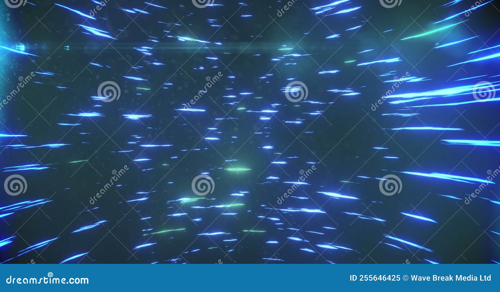 Image of Blue and Green Light Trails Spinning Against Black Background