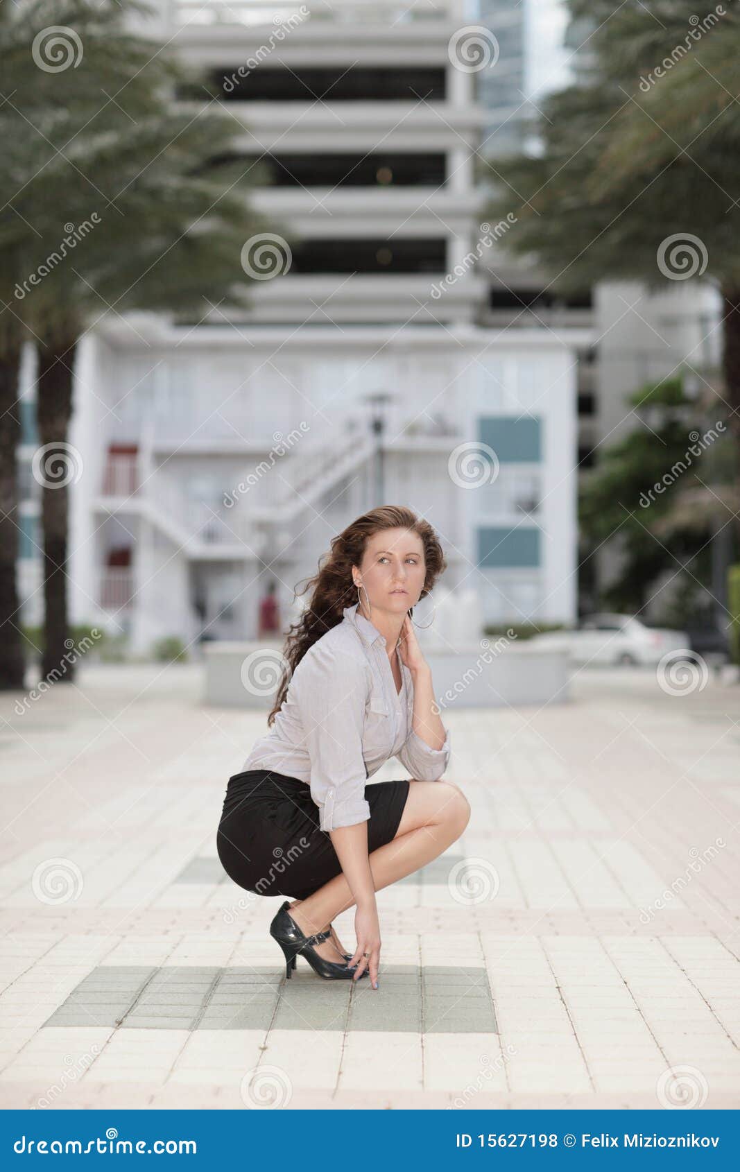 Image Of A Businesswoman Squatting Stock Photo - Image 