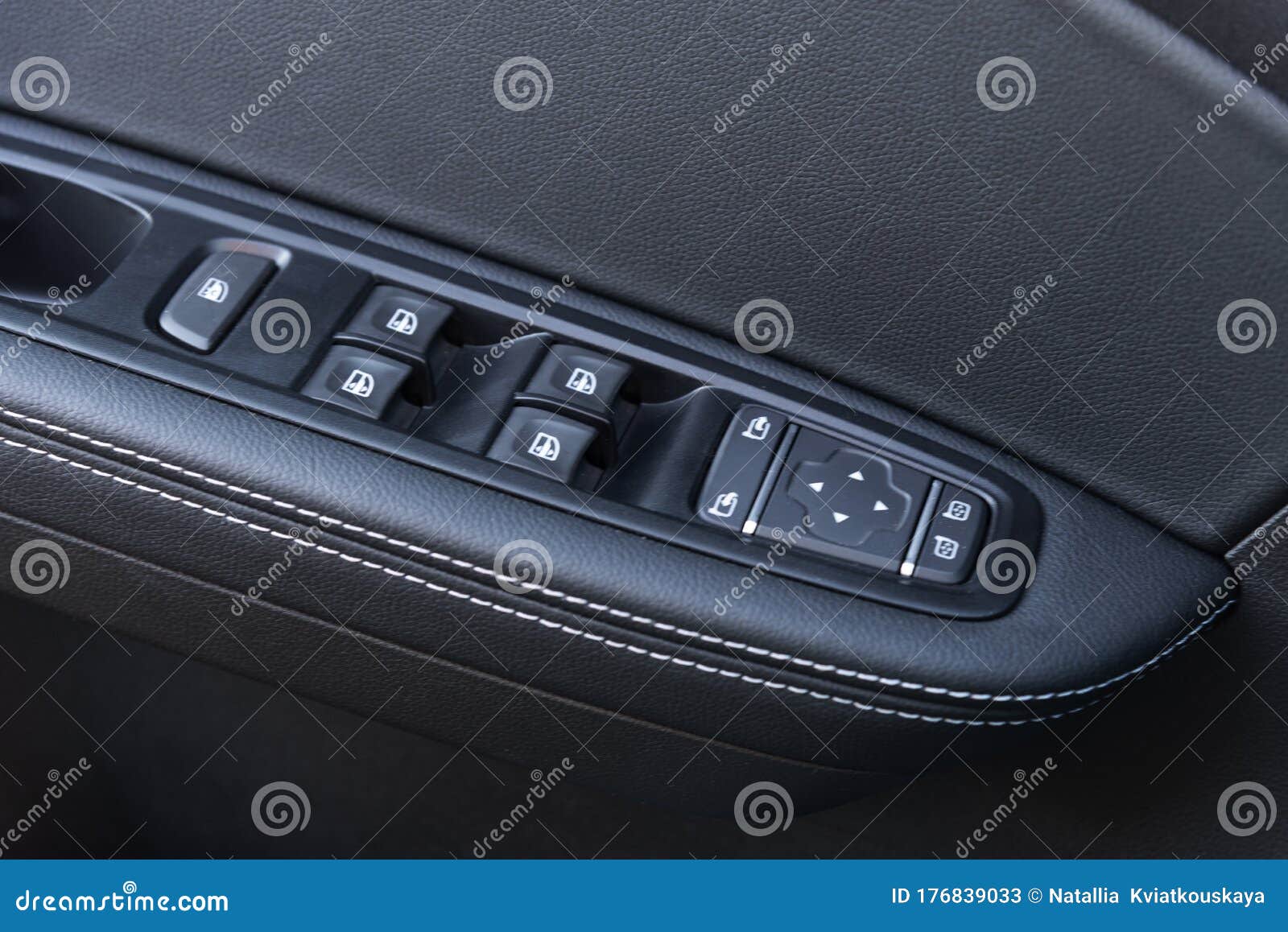 Image In Closeup Of A Door Control Panel In A Modern Car. Arm Rest With