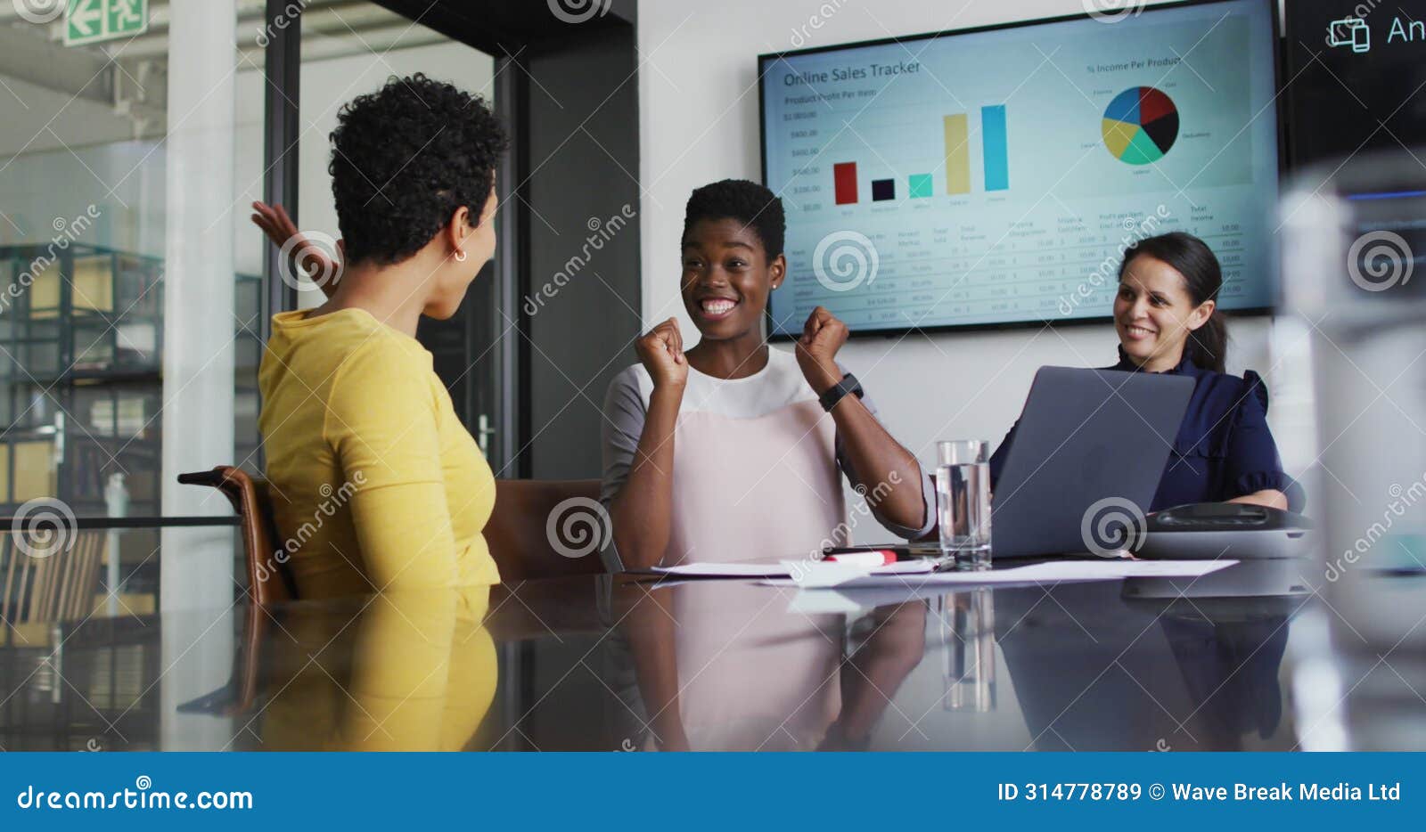 image of data processing and globe over diverse business people high fiving in office