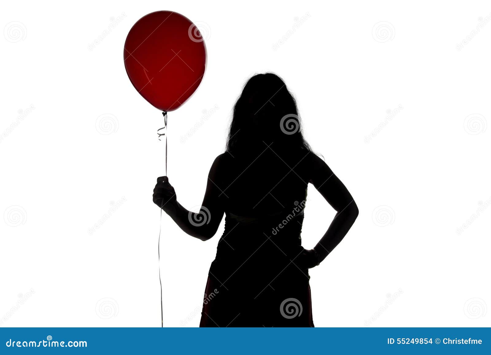 Image De La Silhouette De La Femme Debout Avec Le Ballon Photo