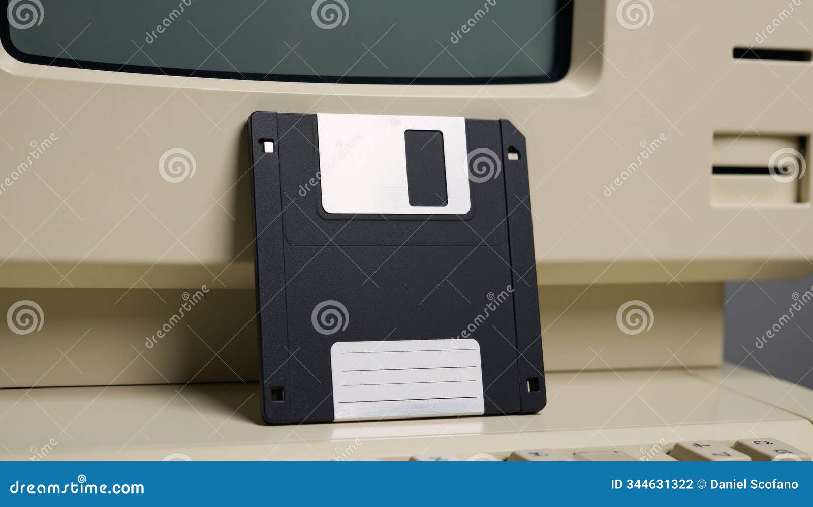 image depicting an aged vintage personal computer with a retro crt monitor and floppy disk system