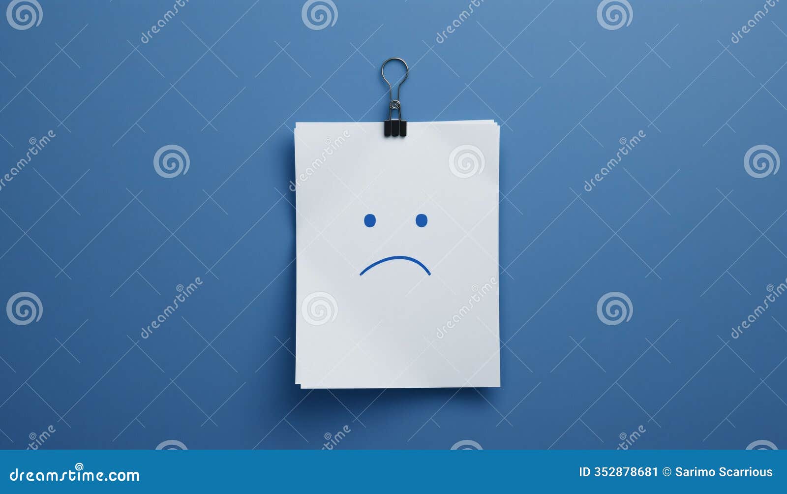 simple sad face  on paper