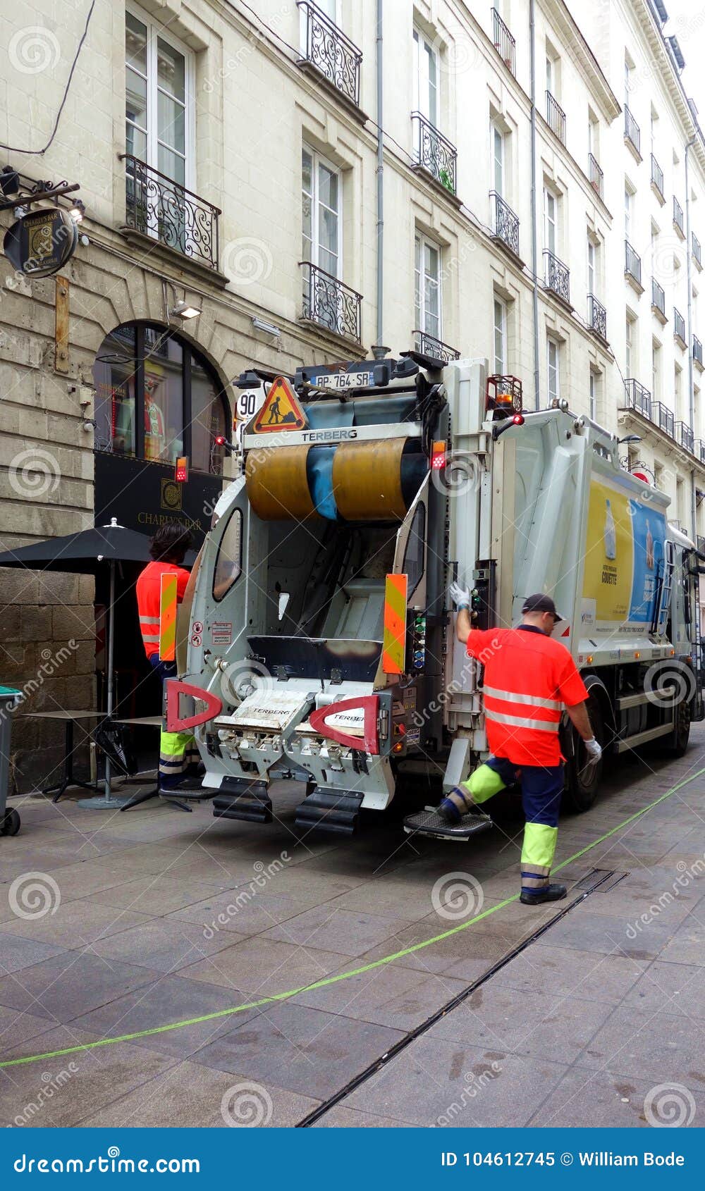 riding garbage truck