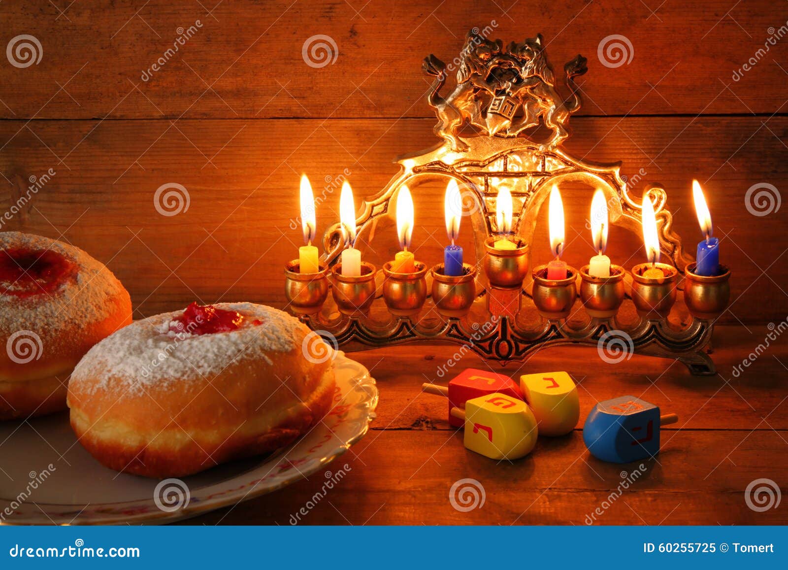 Menorah A Traditional Jewish Holiday Lighting The First Candle On A Hanukkahof A Burning