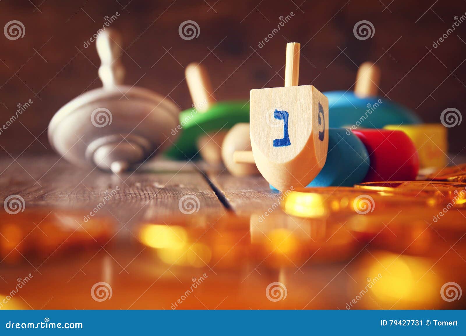image of jewish holiday hanukkah with wooden dreidels
