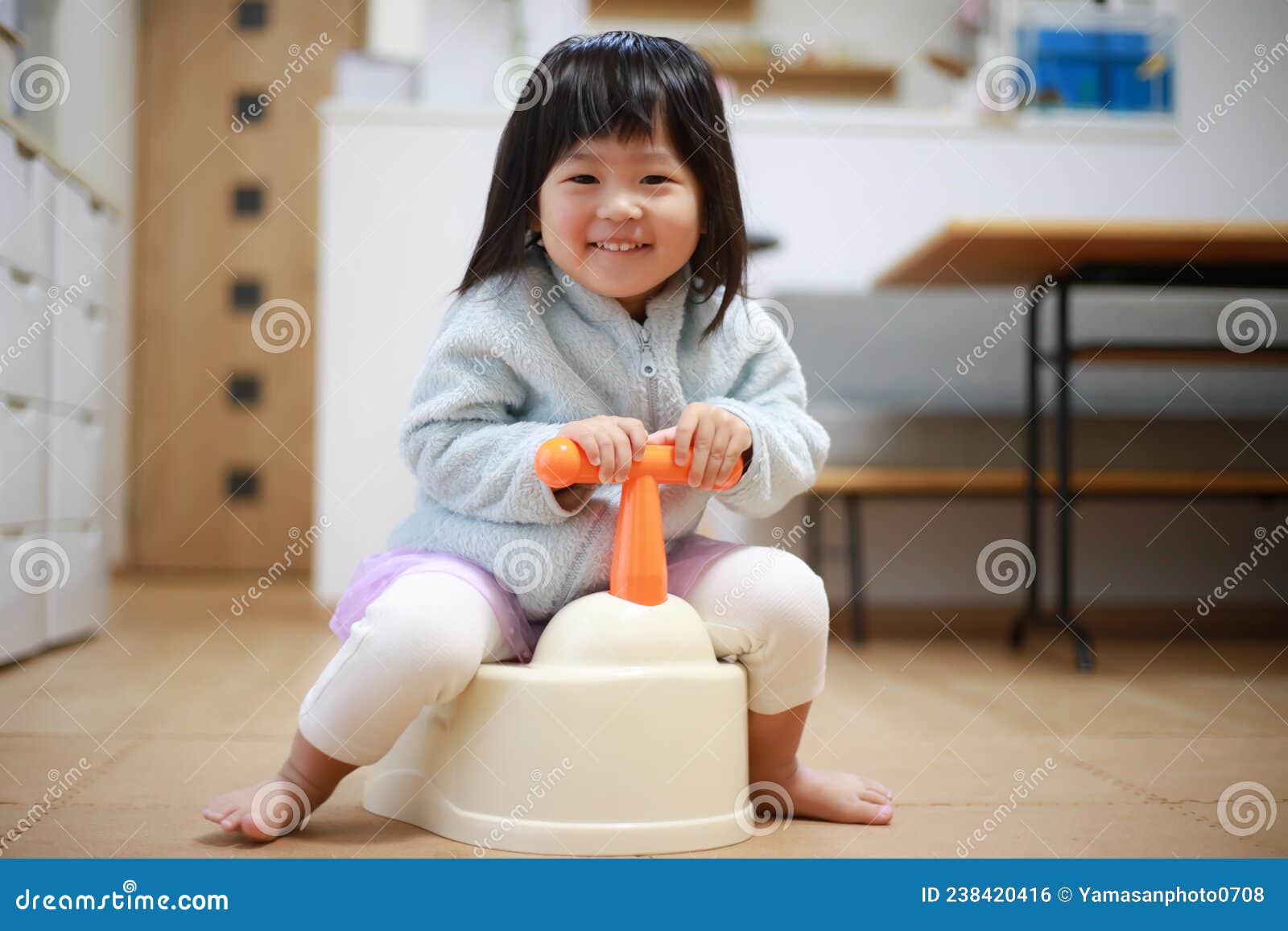 Image of a Girl Training in the Toilet Stock Photo - Image of family ...