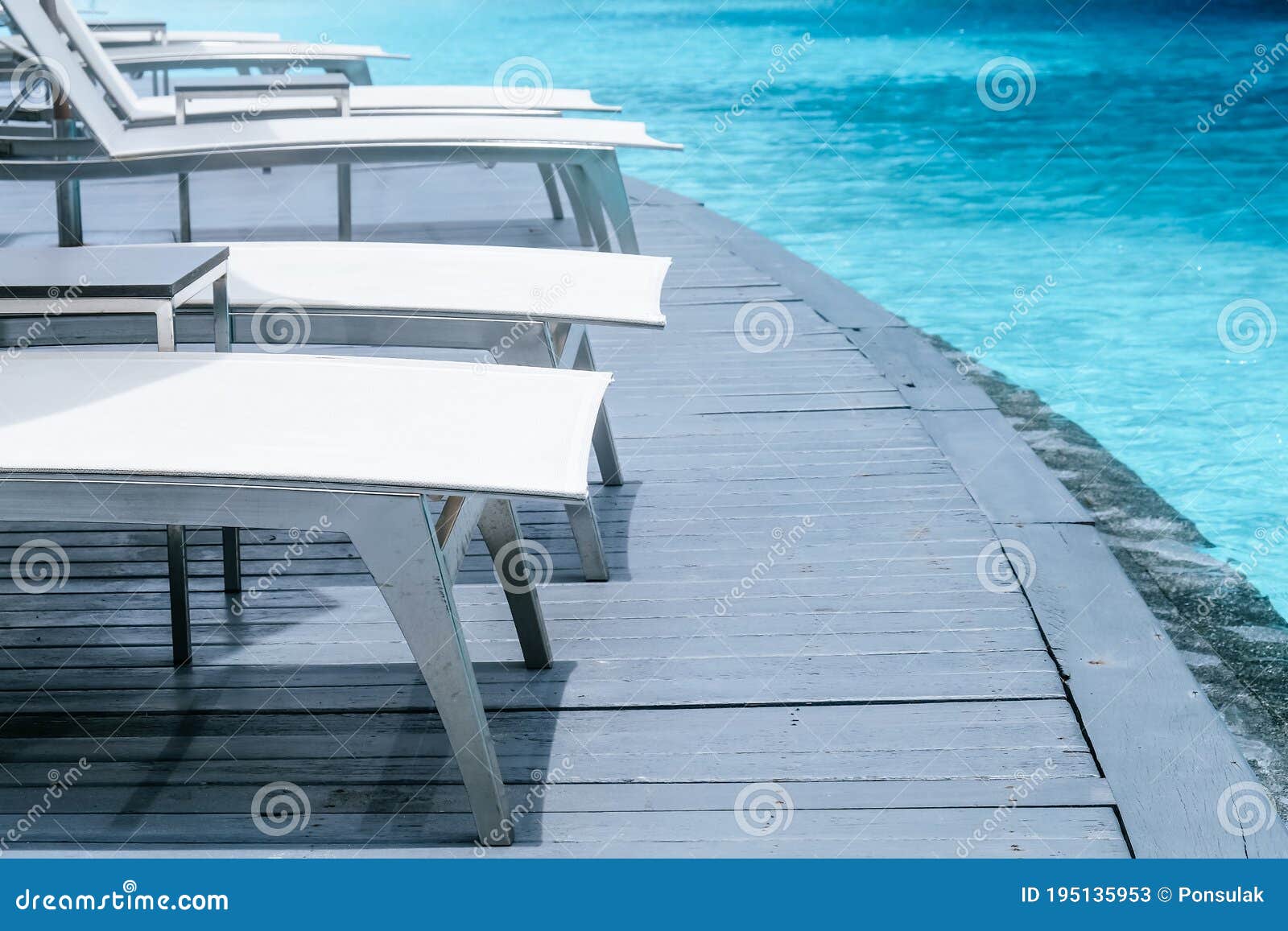 Many White Chaise Lounge by the Pool Stock Image Image of blue