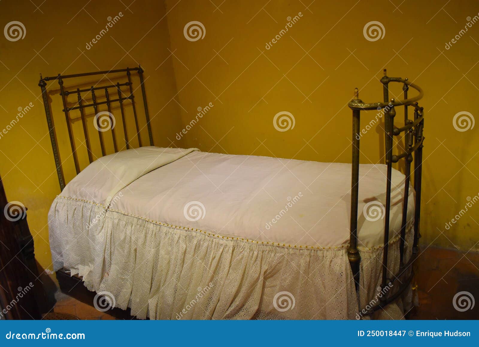 Image of an Old Bedroom, with White Sheets Inside a Museum Editorial