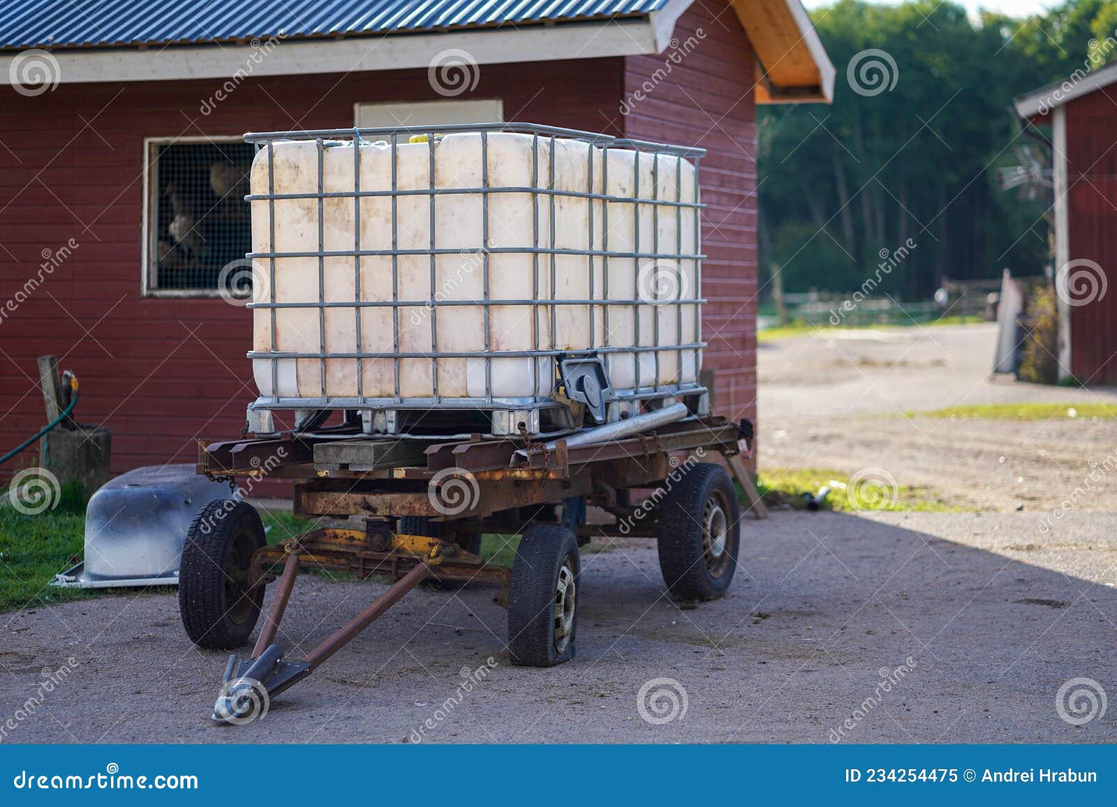Old Plastic Water Tank on the Rusty Trailer at the Animal Farm Stock Image  - Image of farm, country: 234254475
