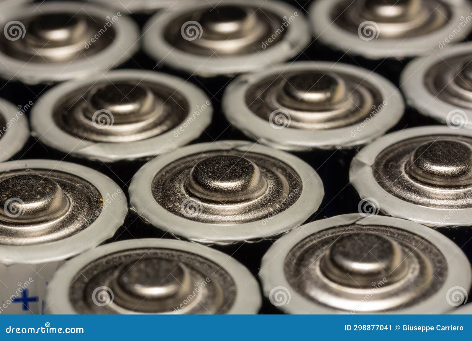 Image of the Positive Side of AA Batteries, Used Today in Many