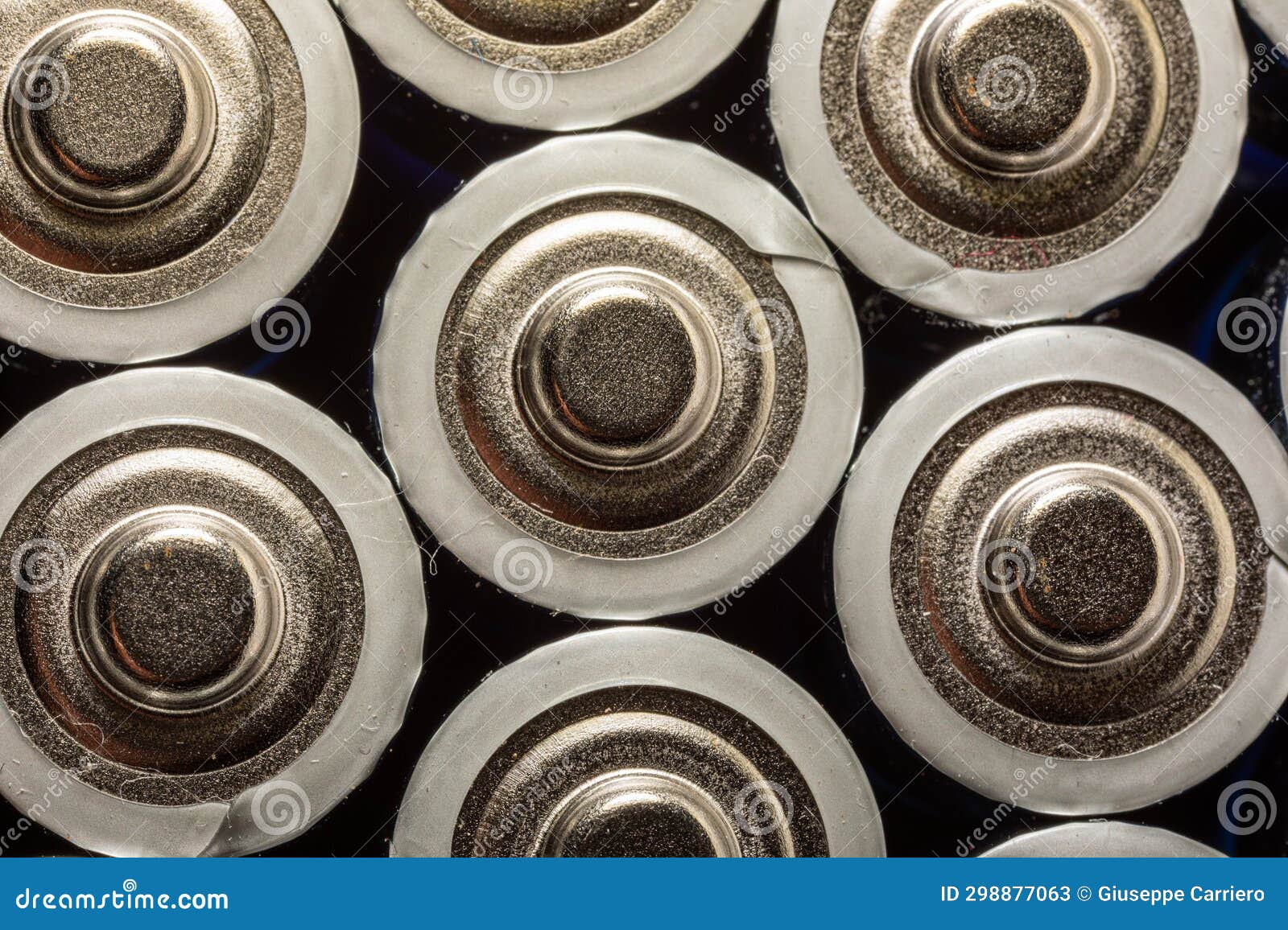 Image of the Positive Side of AA Batteries, Used Today in Many