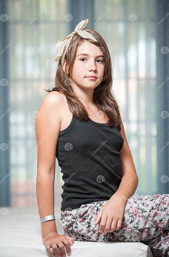 .Image of Pretty Teenager Posing Indoor in a Good Mood Stock Photo ...