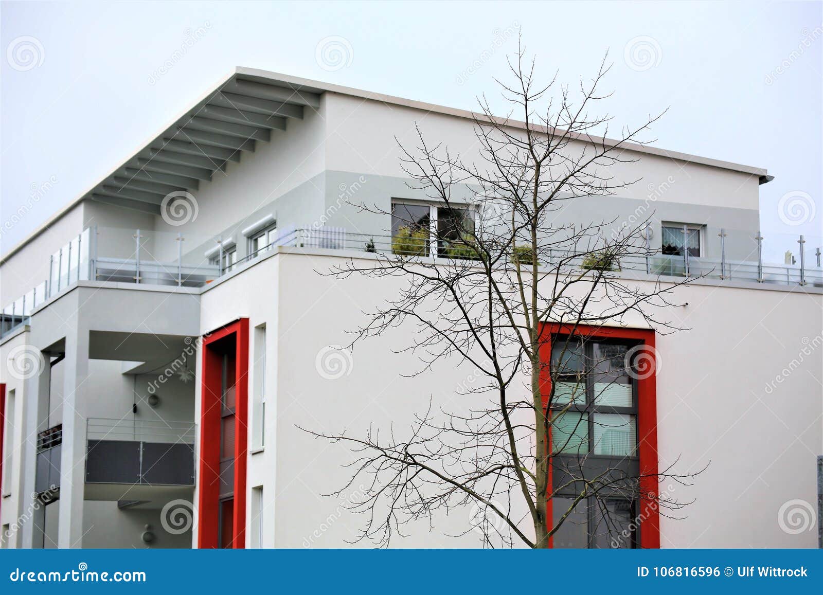 an image of a residential home with modern facade painting, exterior shot