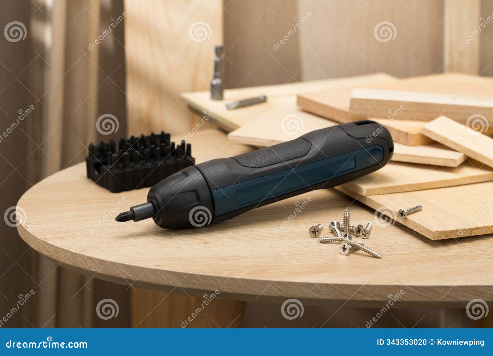 the image showcases a mini handheld cordless screwdriver.