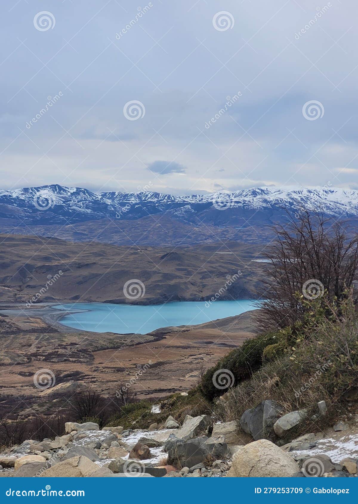 Blue Cold Lake Sorrounded by Mountains in Patagonia Stock Image - Image ...