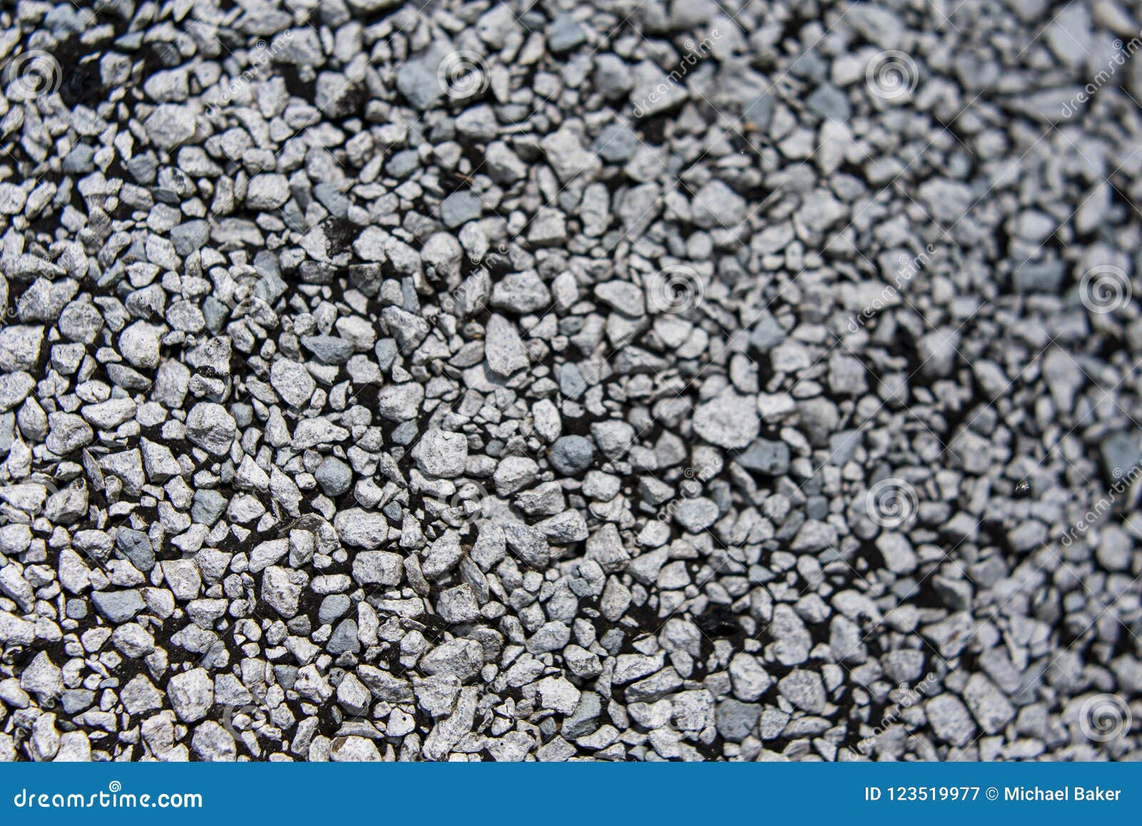 macro texture of a white graveled shingle