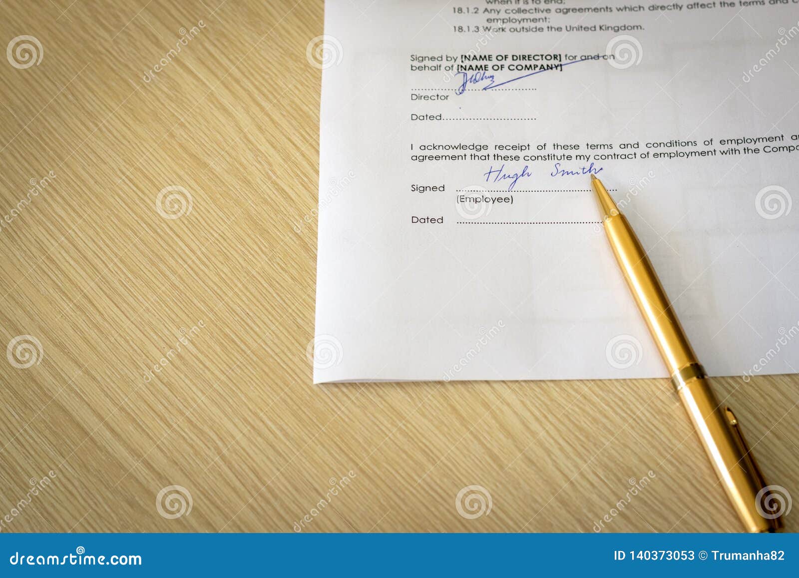 signed employment contract on desk