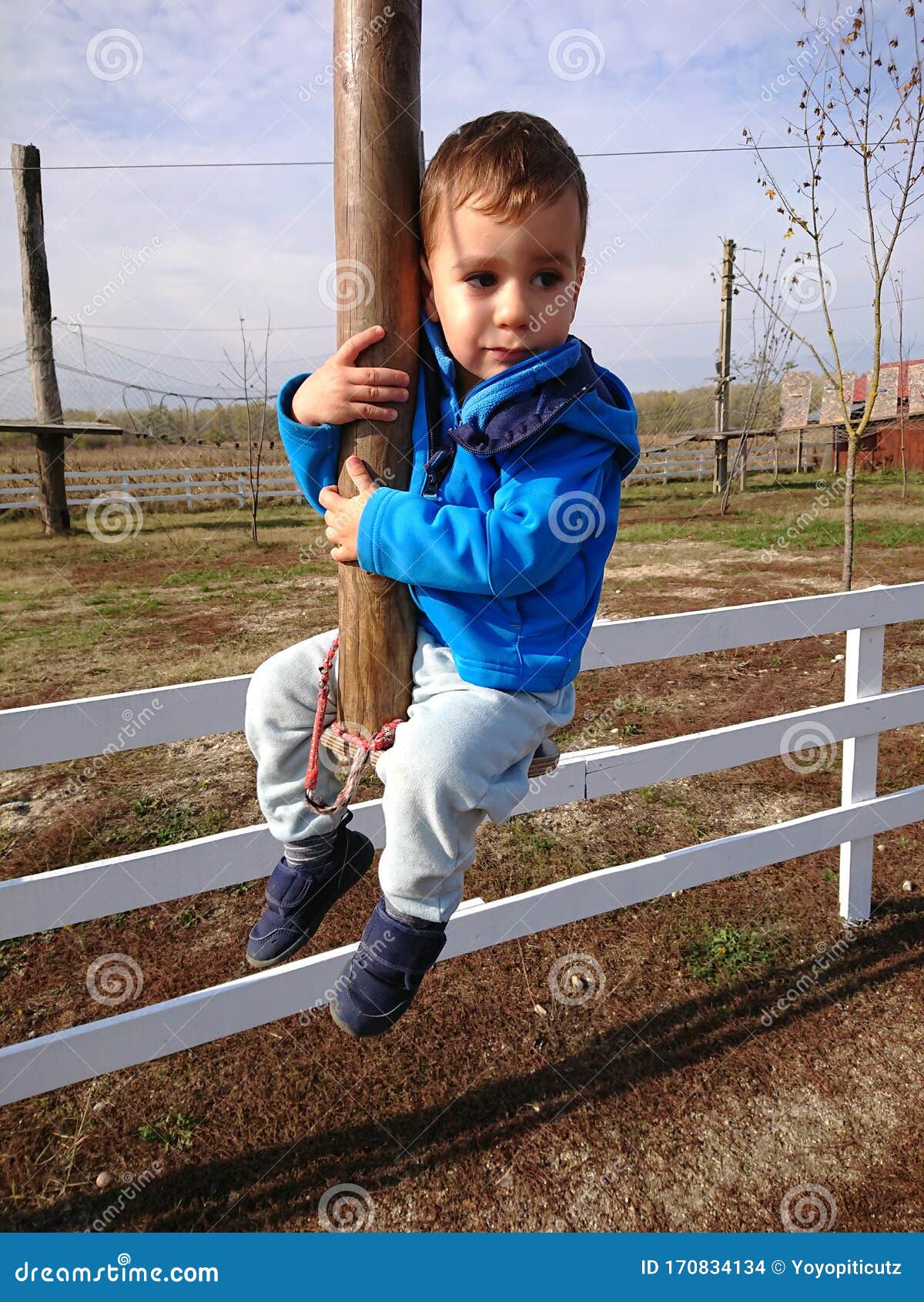 Little boy on a zipline stock photo. Image of small 170834134