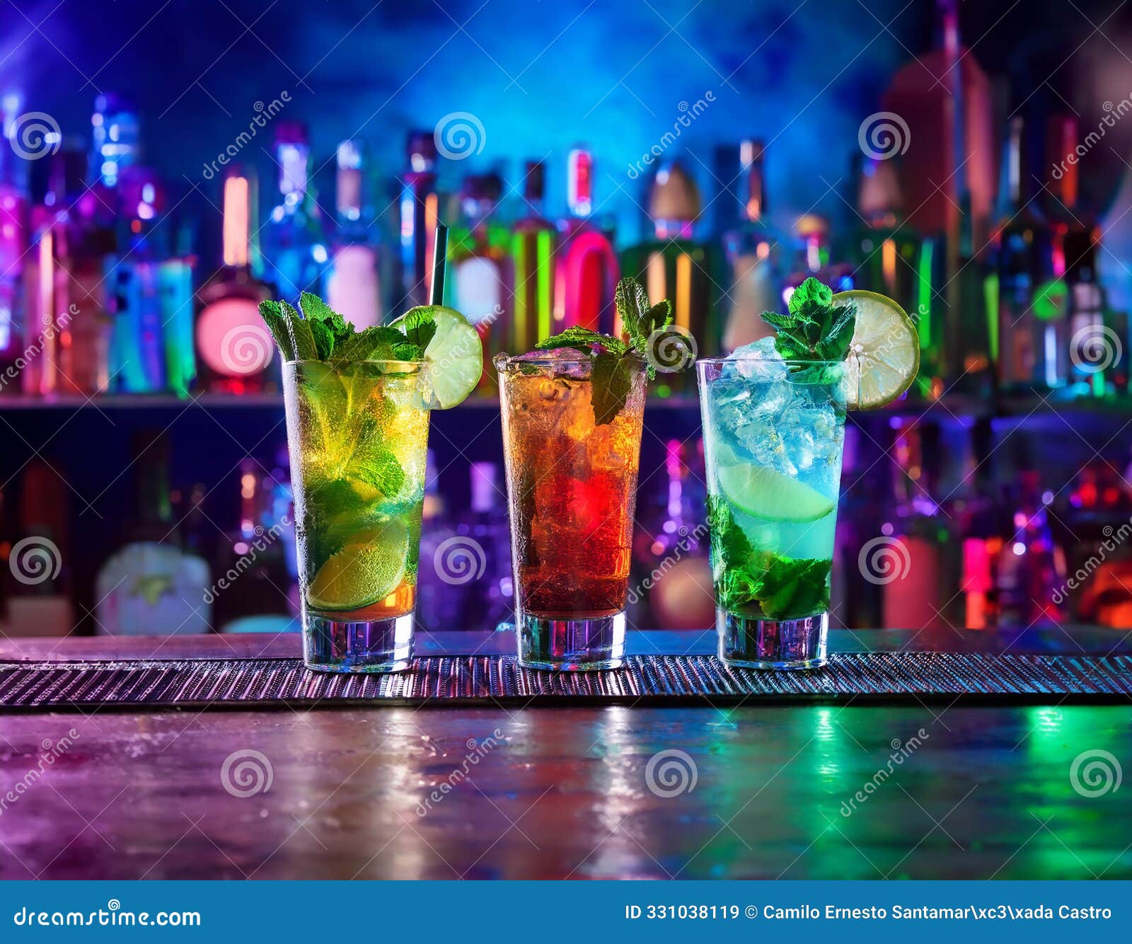 three mojitos cocktails, at the bar with bottles behind