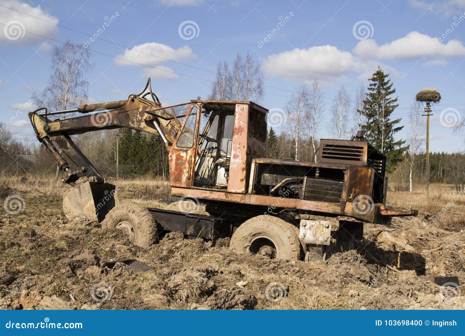 The Image of the Tractor in the Mud Stock Photo - Image of street