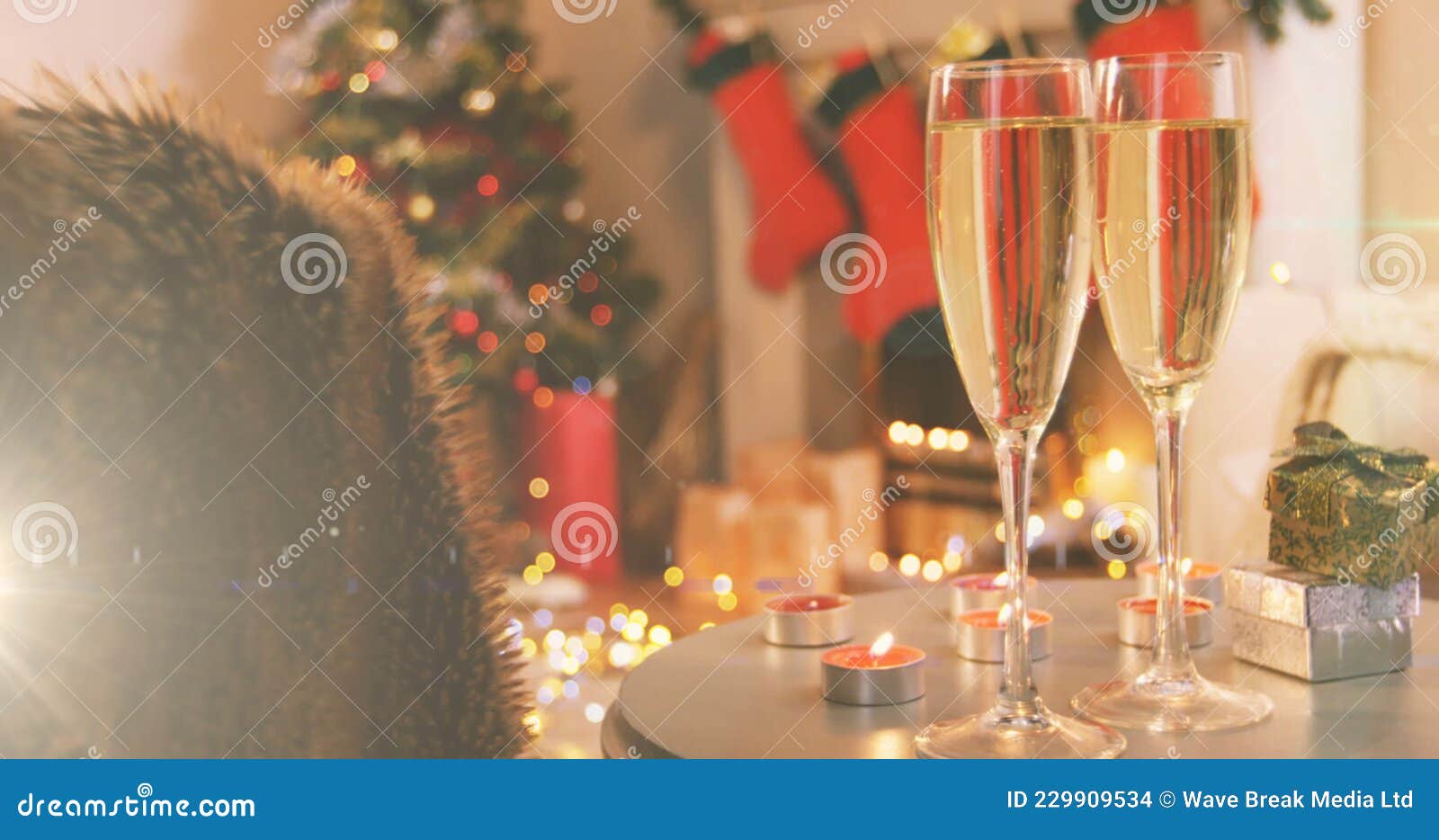 Image of Two Champagne Flutes, Christmas Tree Decorations Stock Photo