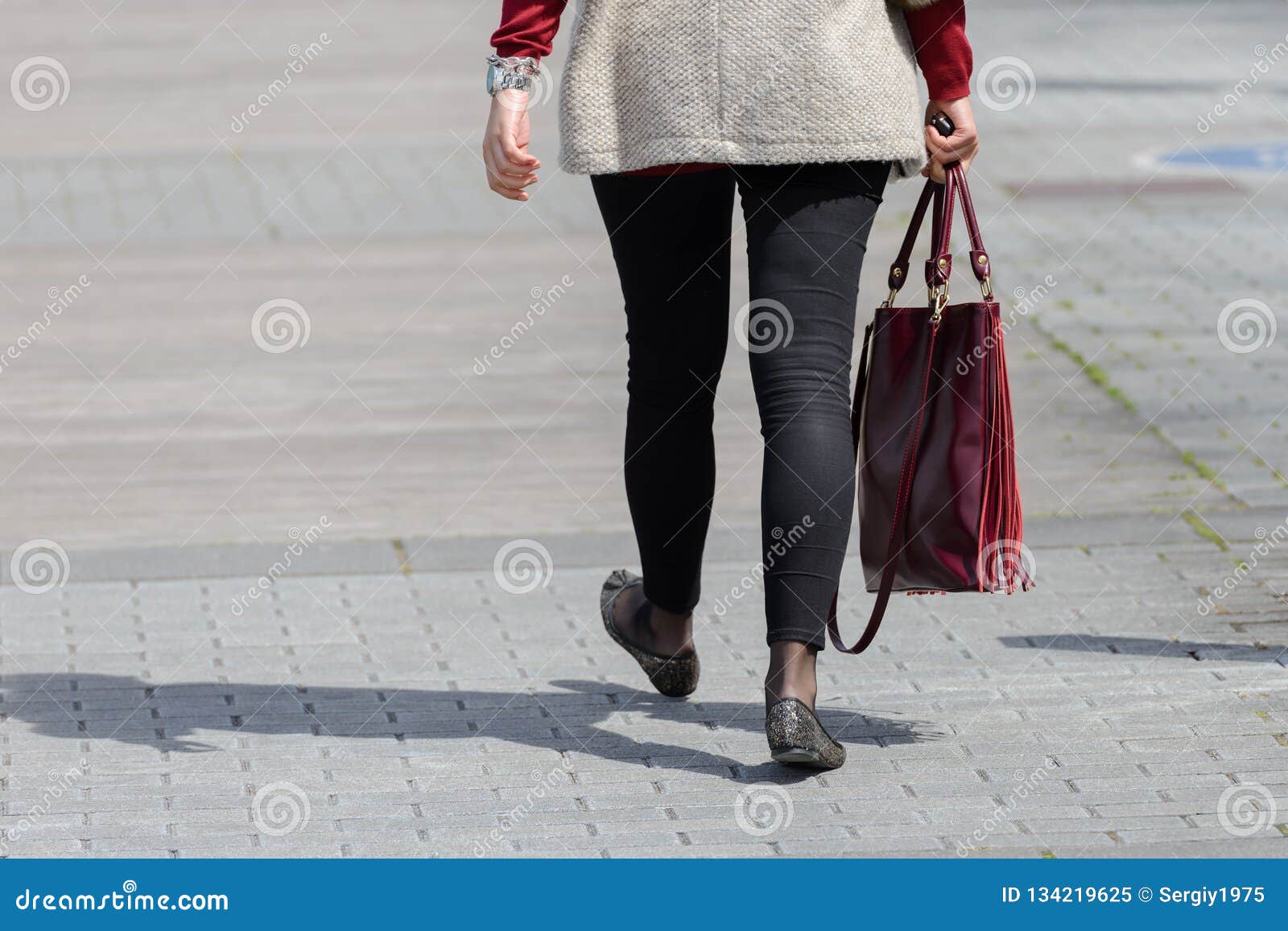 Woman Walking Down the Street with a Bag Stock Image - Image of female ...