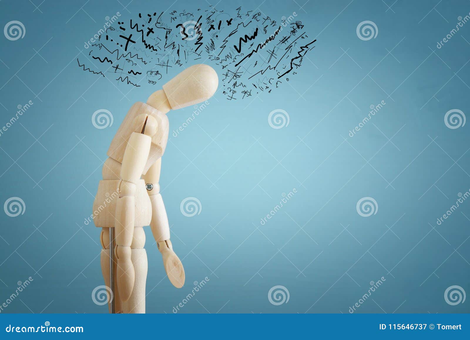 image of wooden dummy with worried stressed thoughts. depression, obsessive compulsive, adhd, anxiety disorders concept.