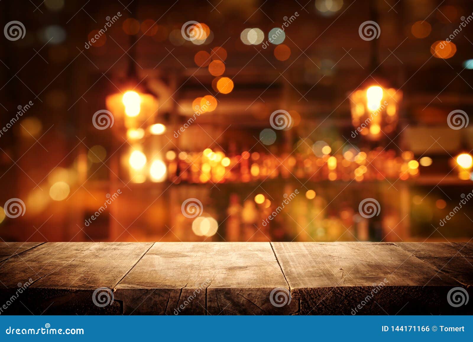 Image of Wooden Table in Front of Abstract Blurred Restaurant Lights ...