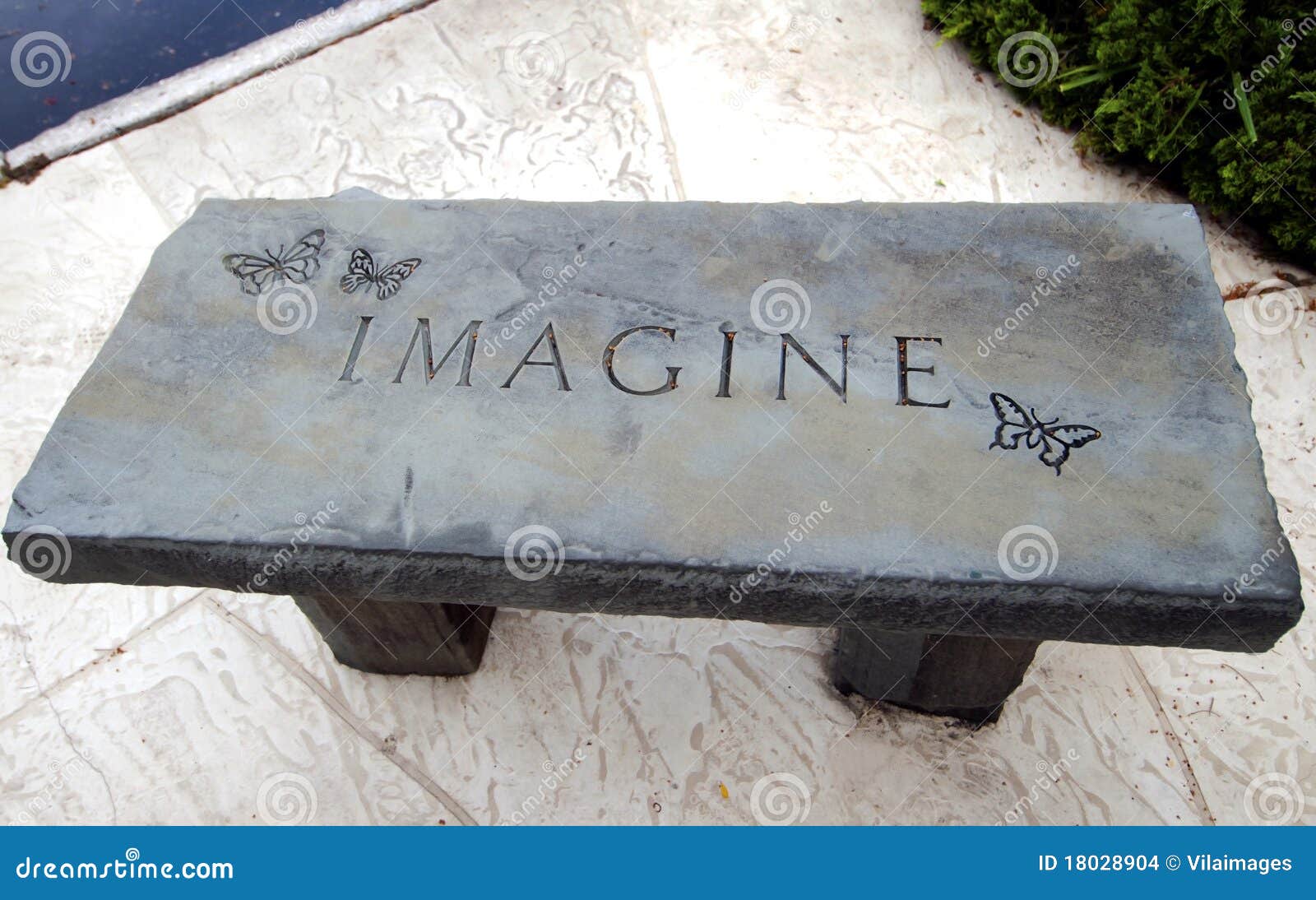 imagine concrete bench engraving.