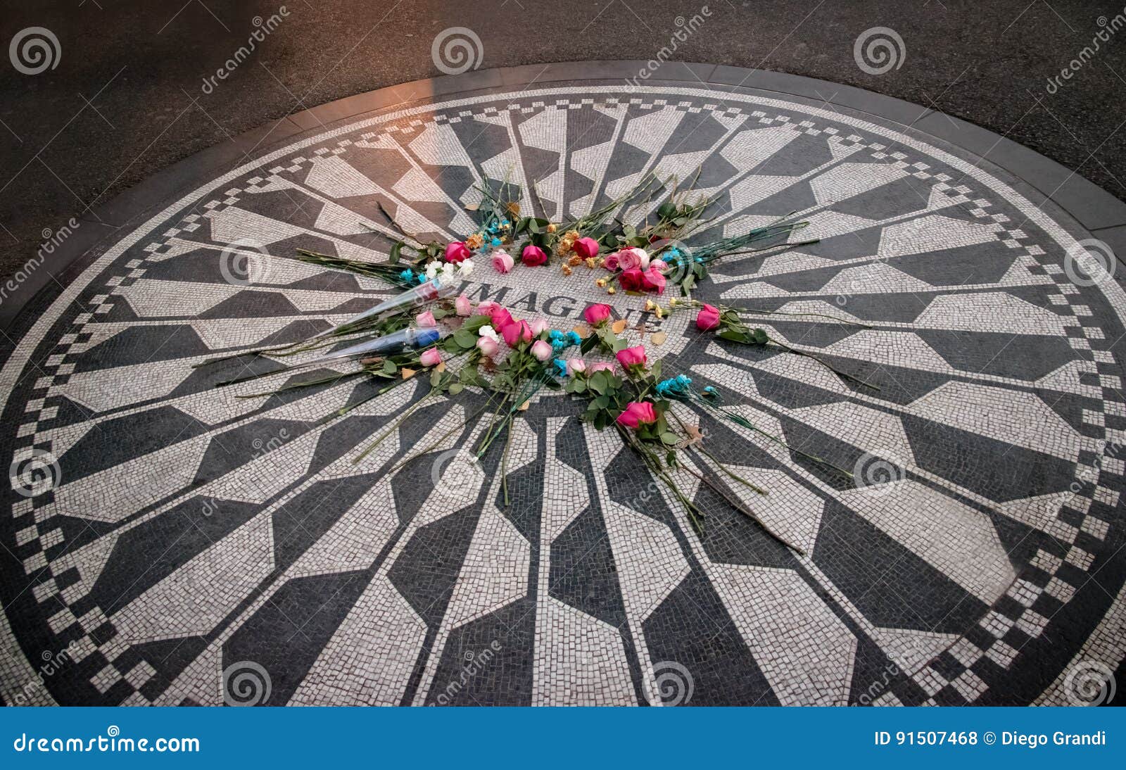 The Imagine Mosaic With Flowers On Day Of John Lennon Death At Strawberry Fields In Central Park Manhattan New York Usa Editorial Stock Photo Image Of Circle Sign The Imagine Mosaic With Flowers On Day Of John Lennon Death At Strawberry Fields In Central Park Manhattan New York Usa Editorial Stock Photo Image Of Circle Sign