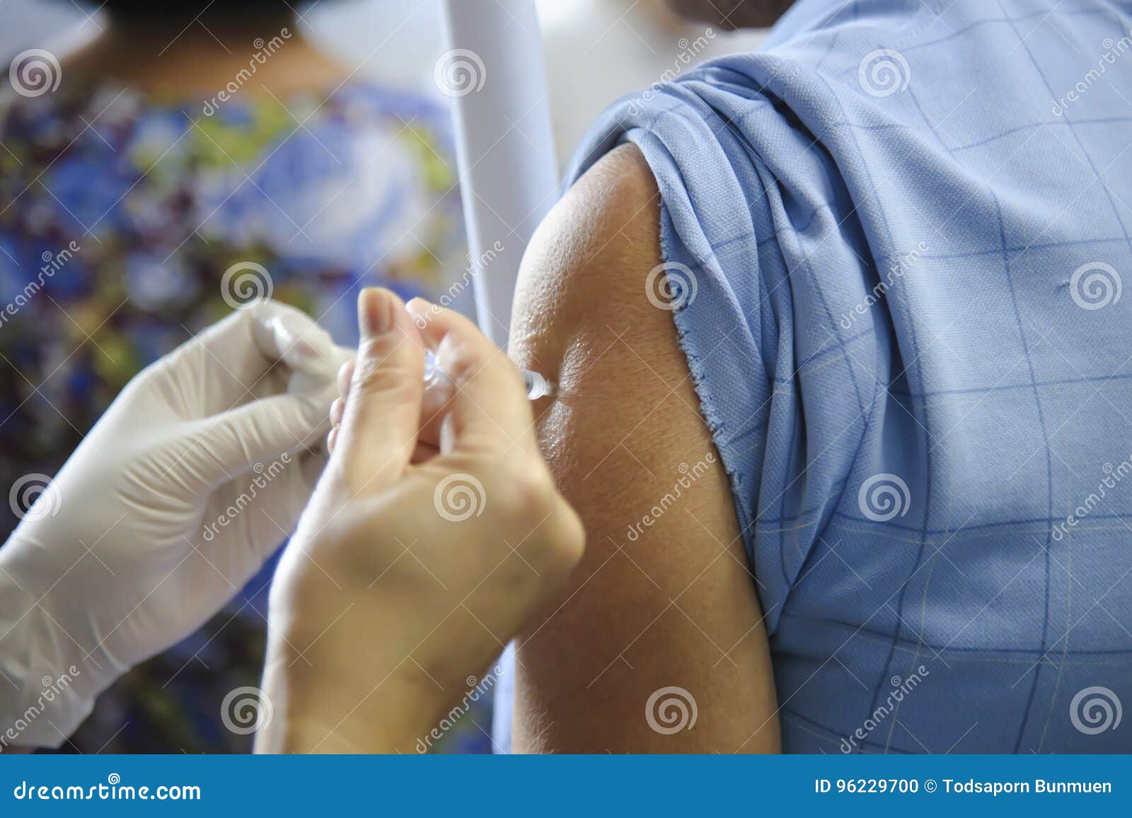 immunization vaccine injection , doctor inject vaccine to patient arm