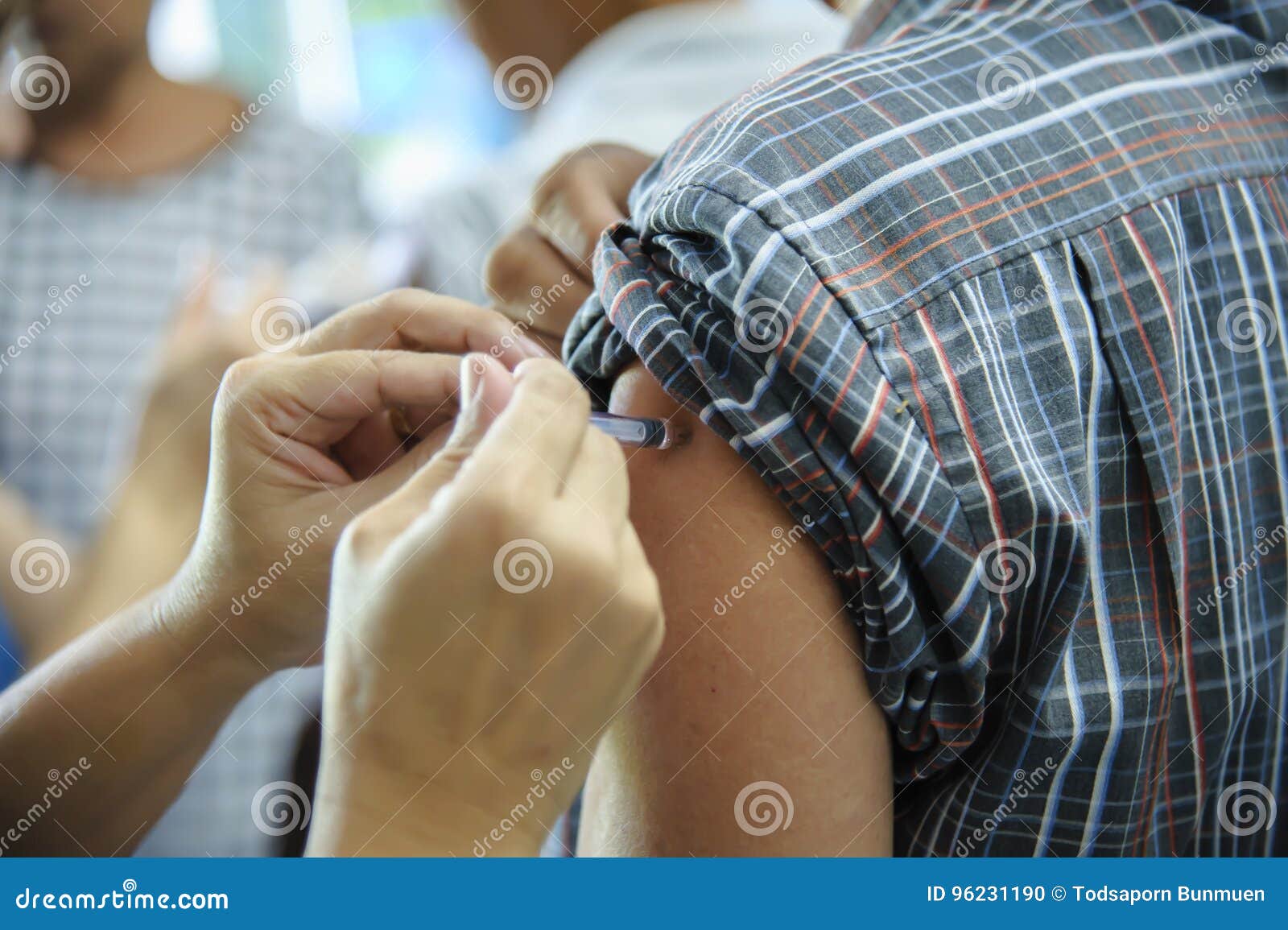 immunization vaccine injection , doctor inject vaccine to patient arm