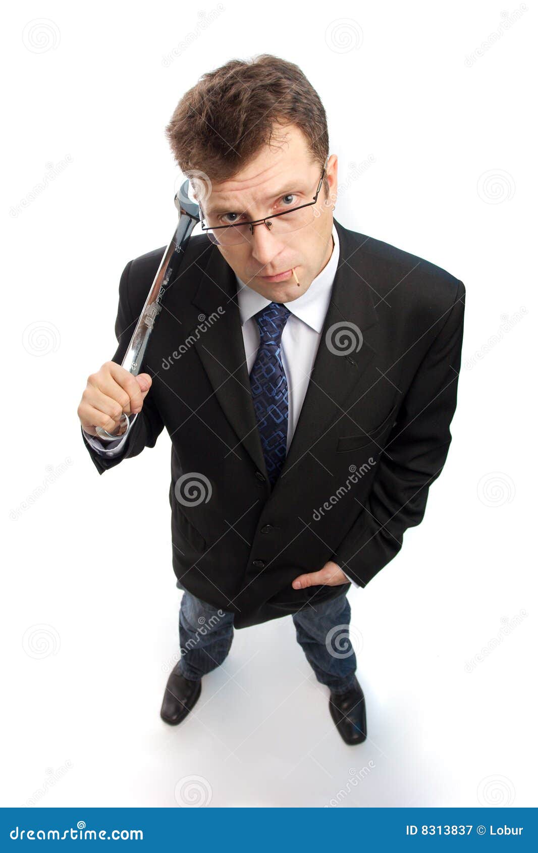impertinent businessman with steel wrench