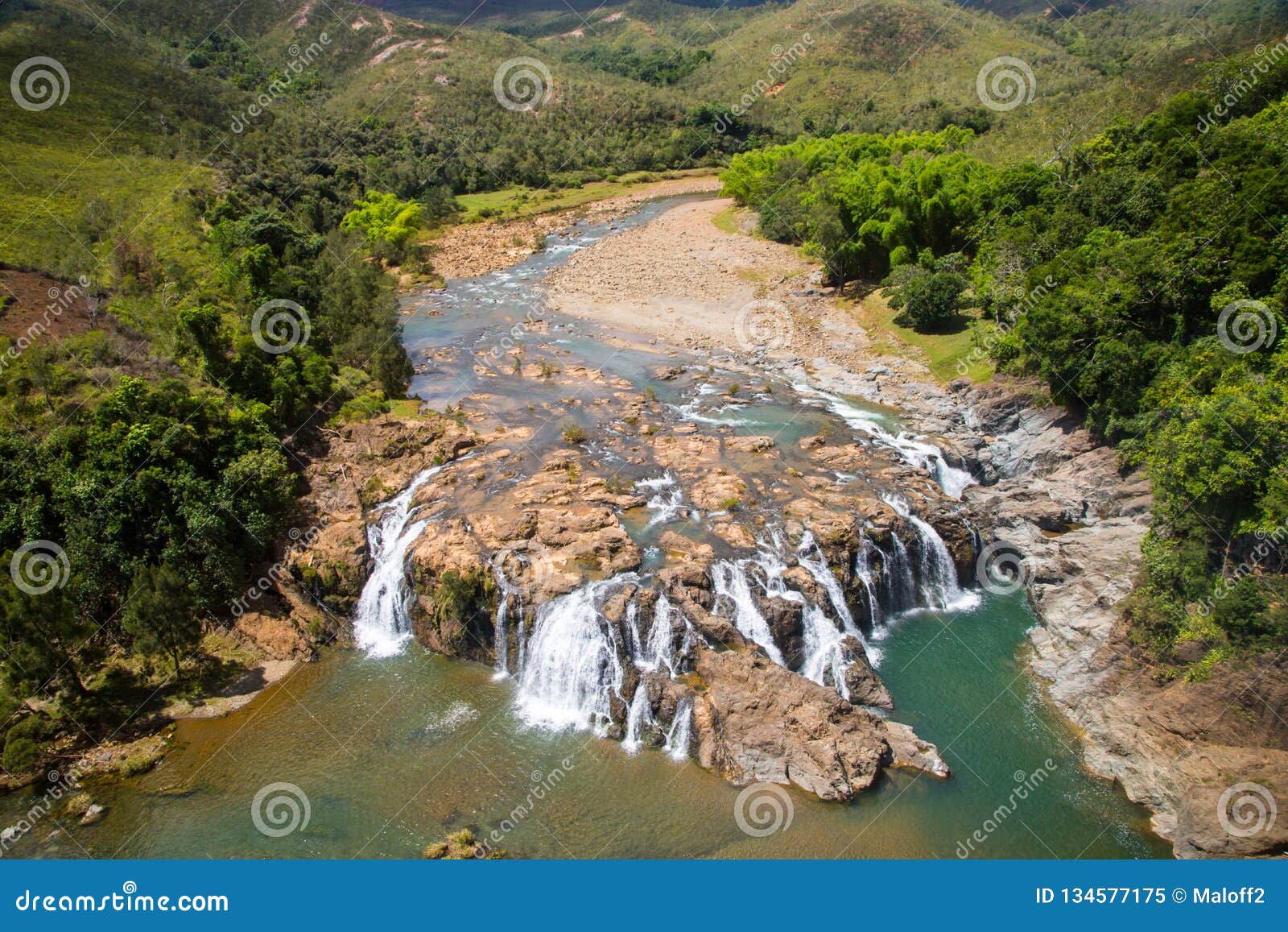 impressive waterfalls on koua river aerial view, between poro and kouaoua, north province, new caledonia, melanesia, oceania.