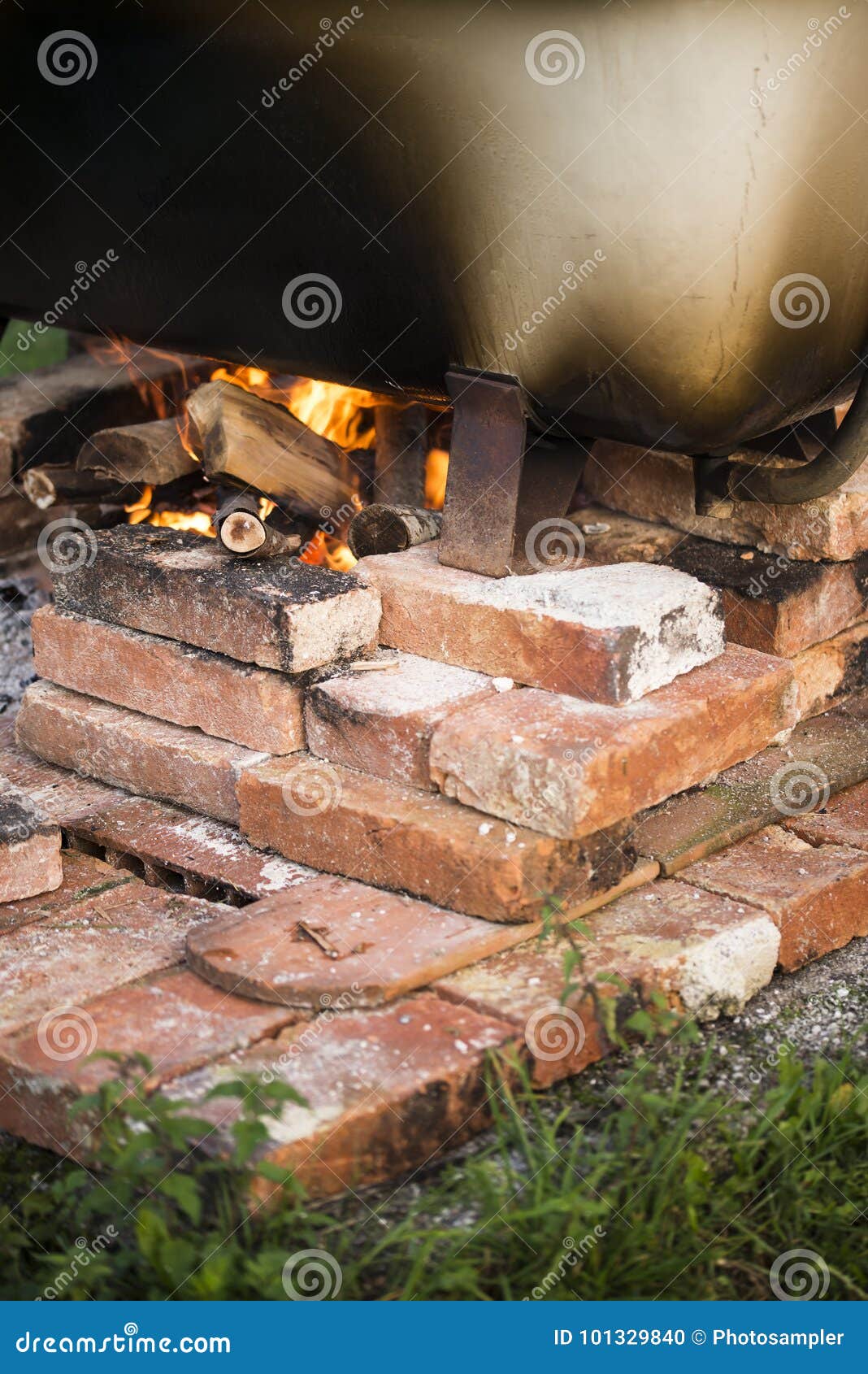 Improvised Hot Bathtub with Fire Underneath. Stock Photo Image of