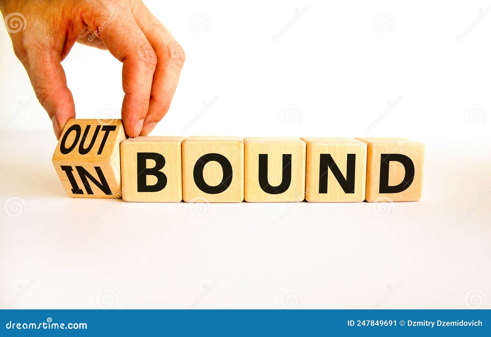 Inbound or Outbound Symbol. Businessman Turns Wooden Cubes and Changes