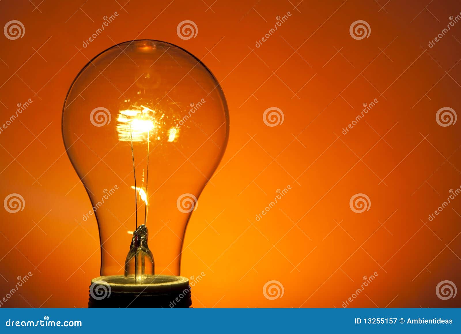 Incandescent Light Bulb on Orange Stock Image Image of bulb, lighting