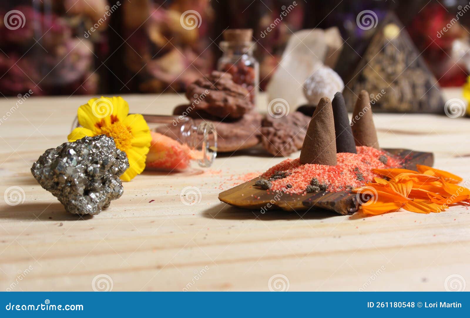 Incense Cones on Stone Slab with Crystals and Flowers Stock Photo