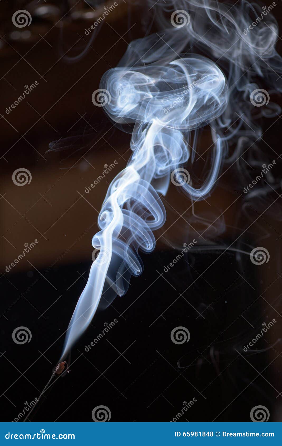 Incense Stick Smolders and Creates Smoke and Smell Stock Photo Image