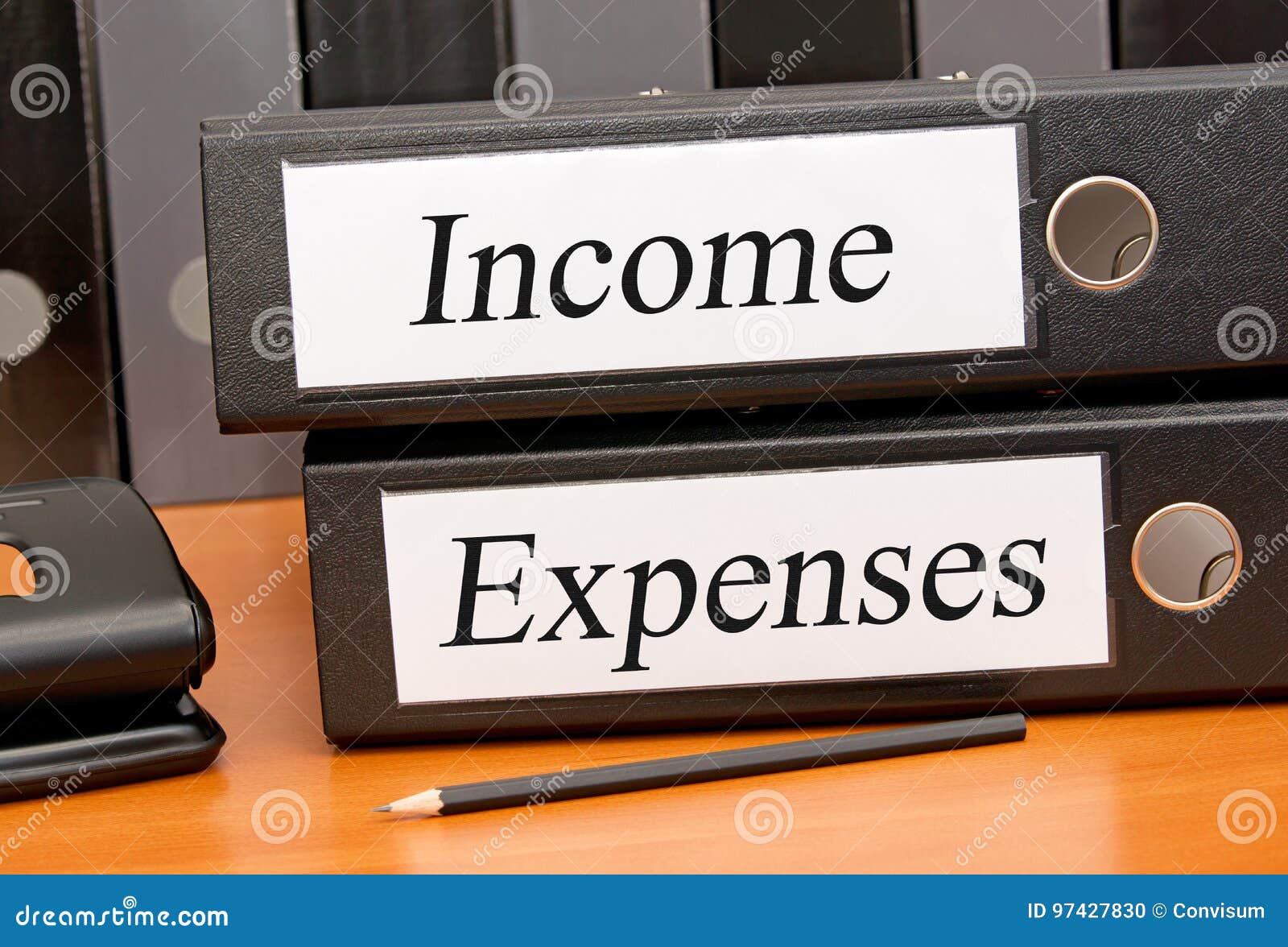 income and expenses, two binders in the office